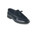 Classic loafers crafted from textured glossy leather with suede accents