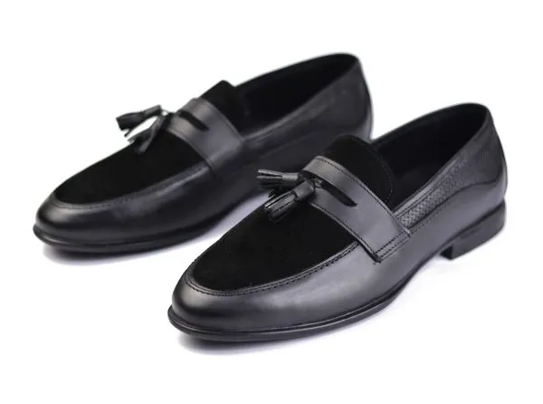 Penny loafers made from a blend of genuine leather and suede