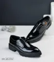 Casual glossy leather shoes with a raised sole