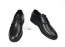 Smart black shoes made from genuine leather with a rubber sole