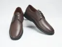 Smart black shoes made from genuine leather with a rubber sole