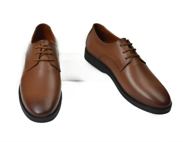 Smart black shoes made from genuine leather with a rubber sole