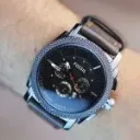 ساعه فوسيل جلد طبيعي