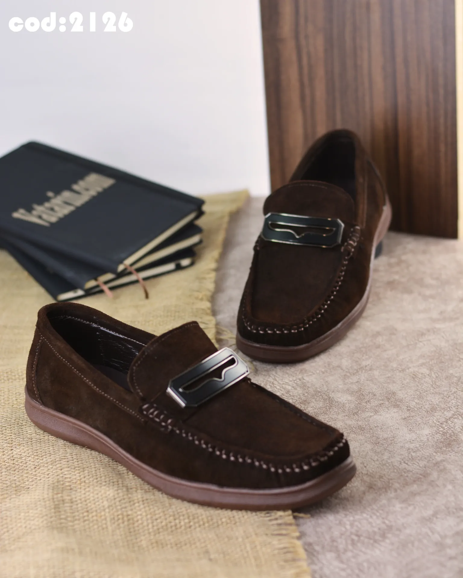 Suede leather Pans shoes with a rubber sole.