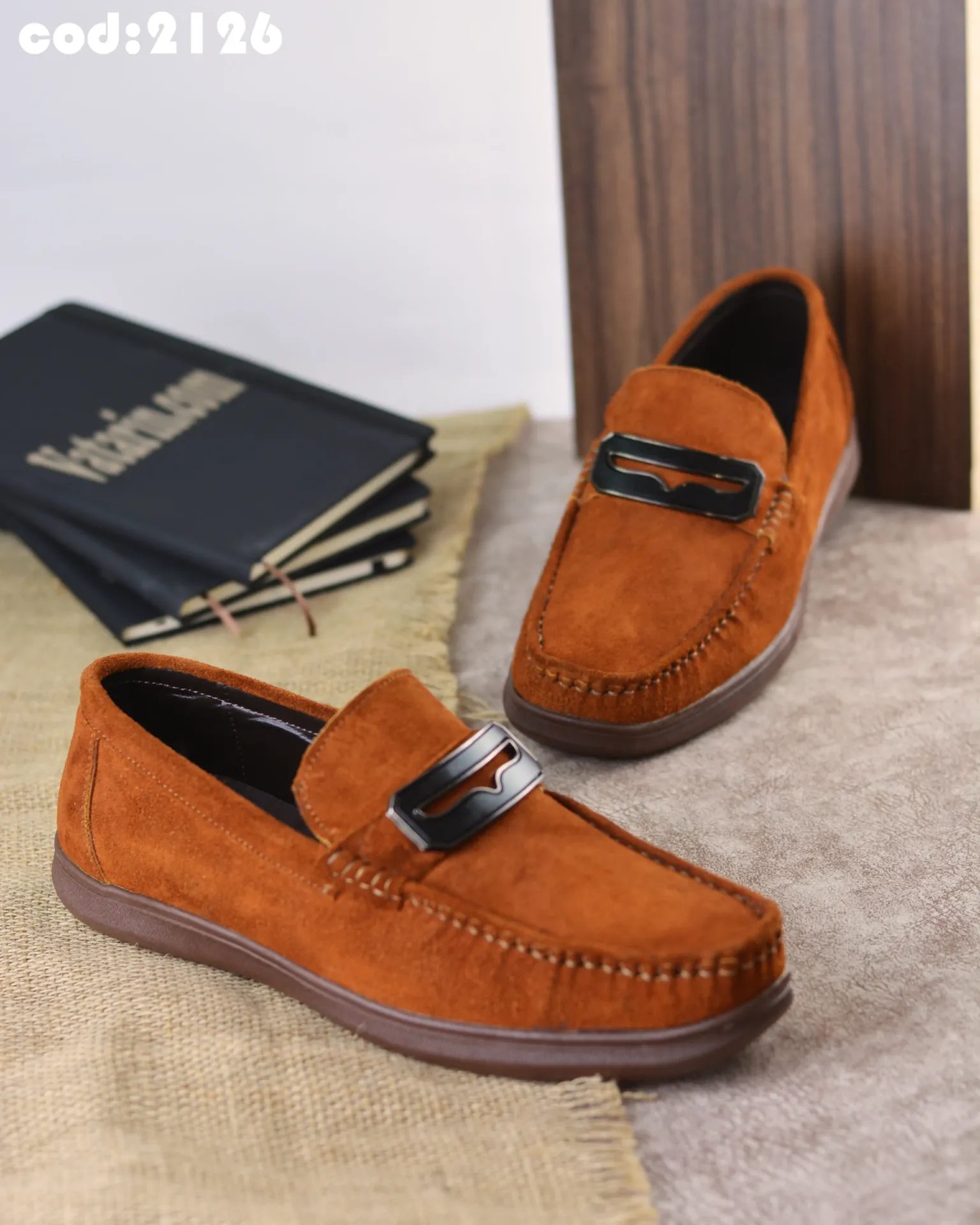 Suede leather Pans shoes with a rubber sole.