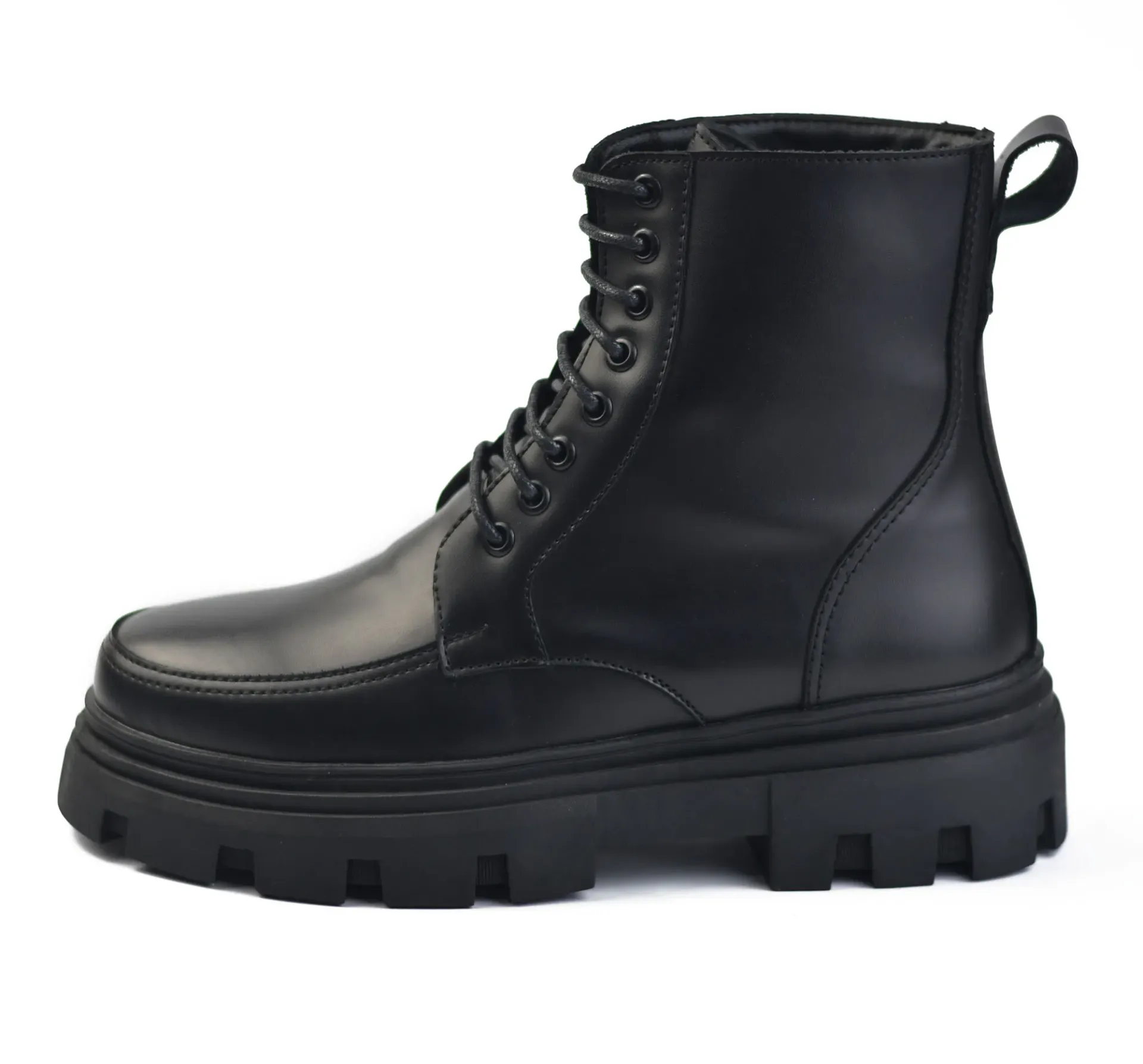 Lace-up leather boots with a foam sole