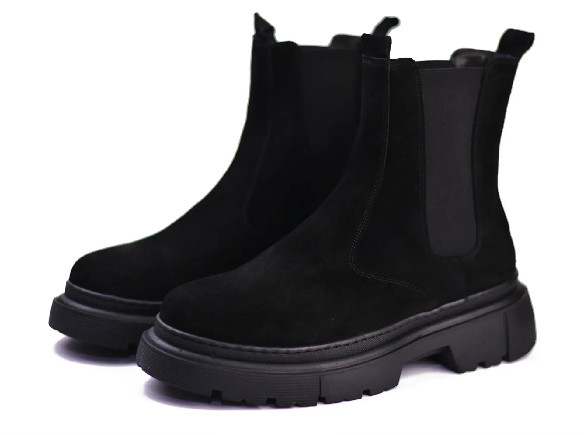 Black suede boots with a lightweight foam sole